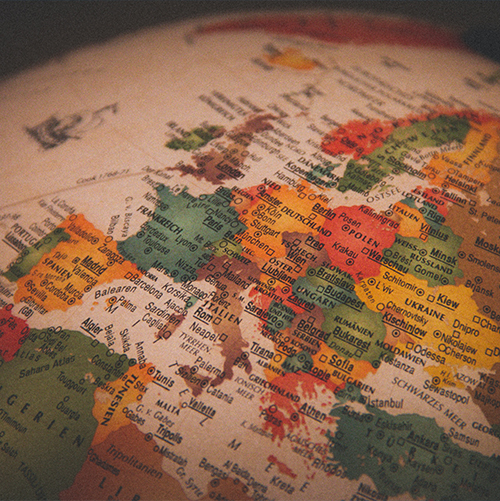 A close-up image of a globe, focused on Europe.